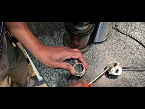 Gaggia MD15 Grinder - fitting shims to make it a finer grind.