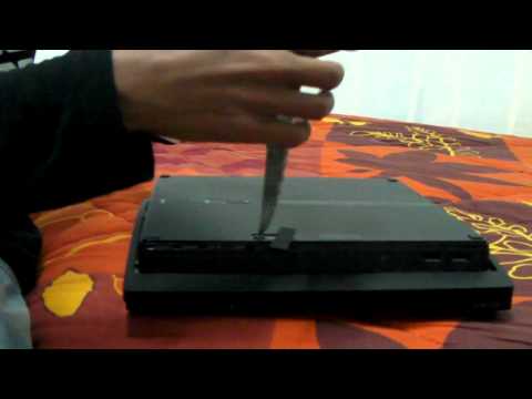 comment demonter disque dur ps3 slim