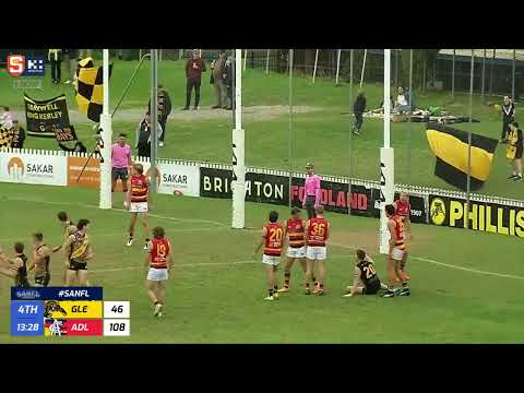 Rd 13 SANFL Snapshot - Glenelg's Liam McBean soccers in square