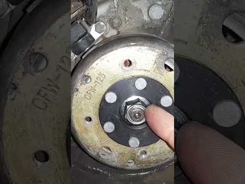 scooter.........remove magneto nut with brake pads