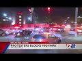 Protesters briefly block I-95 with U-Haul, bring traffic to a standstill