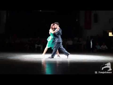  Sebastian Achaval  and  Roxana Suarez  are  dancing  to  "  Tus palabras y la noche  "  by  Carlos di Sarli  at  Lisbon International Tango Festival  in  2016
