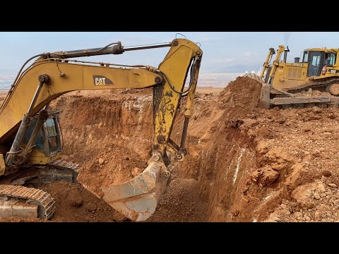 Caterpillar 365C Excavator Loading Trucks, Caterpillar D8R Ripping And Caterpillar D6R Leveling