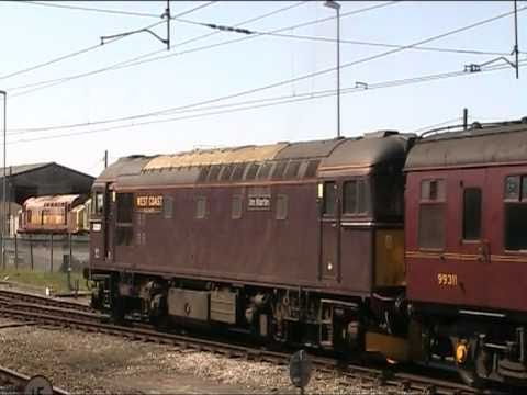 33207 Jim Martin departing Carnforth with ecs for Southall 28th April 2011