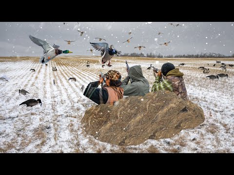 SNOW STORM DUCK HUNT!! COVERED UP IN MALLARDS!