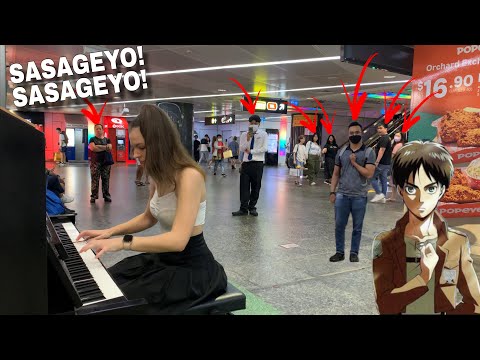 I played SASAGEYO (ATTACK ON TITAN OP) on piano in public!