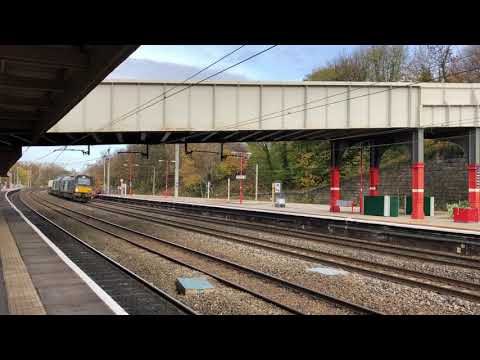 DRS 68002 (intrepid) and 68004 (rapid) passing through Lancaster station on the chemical train