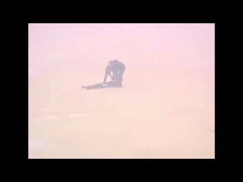 Raw: Surfer Aids Rescue Then Rides Huge Wave