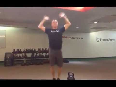 Franz Snideman performs a 40kg Kettlebell Press