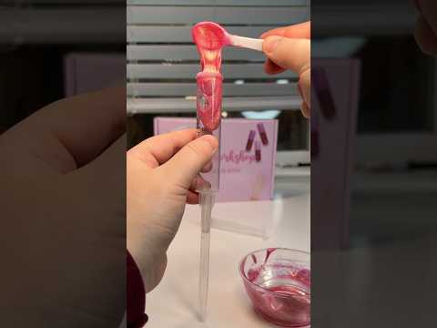 Part of a video titled How to fill a lip gloss tube: - YouTube