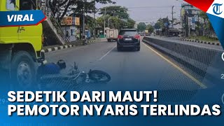SEDETIK DARI MAUT! Viral Momen Pengendara Motor Nyaris Terlindas Truk, Terekam Dashboard Mobil
