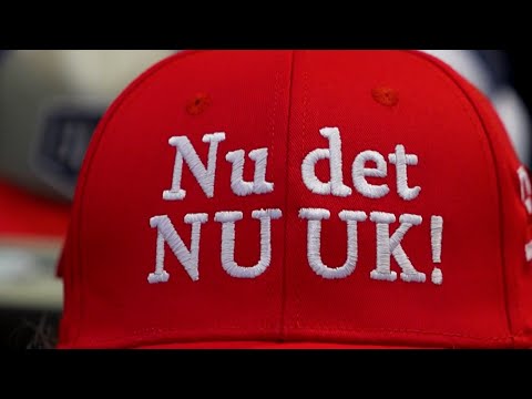 Protestors In Denmark Wear Red Ball Caps With Messages Supporting Greenland