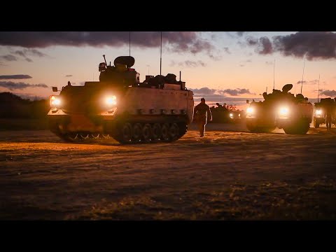 U.S. Marines amphibious assault vehicles in preparation for a simulated beach assault of Kings Beach