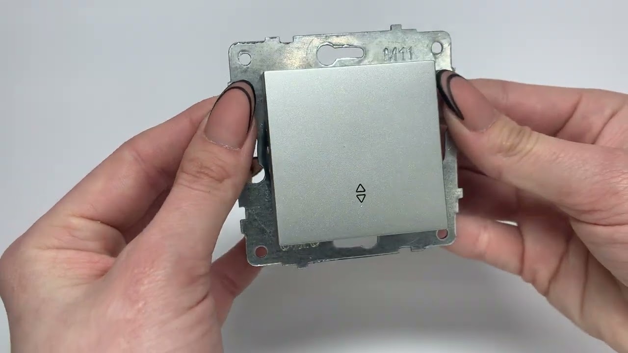 Вимикач прохідний одноклавішний OVIVO Grano срібло (600-000210-209)