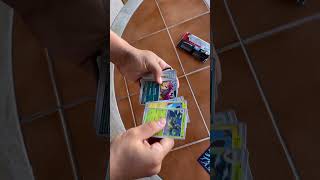 Opening a Twilight Masquerade Pokemon booster pack