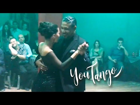  Roberto Zuccarino  and  Magdalena Valdez  are  dancing  to  the  milonga  "  Milonga del 38  "  by  Juan D'Arienzo  in  2019