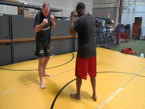 Lethwei front leg roundhouse off drop step