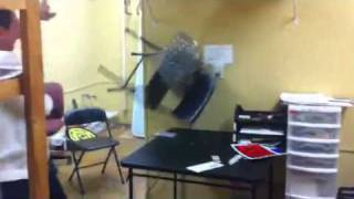 Man beats the crap out of steel chair with nunchucks!