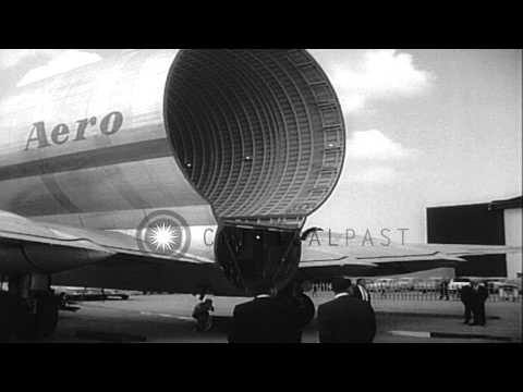 Missile components are loaded into a modified Stratocruiser aircraft in the Unite...HD Stock Footage
