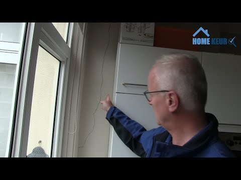 Scheuren in muren appartement Rotterdam