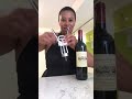 How to open a bottle of wine using a winged corkscrew.
