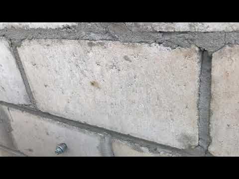 Pull out test for mechanical anchor with fisher sleeve to fix the stone cladding on Block work