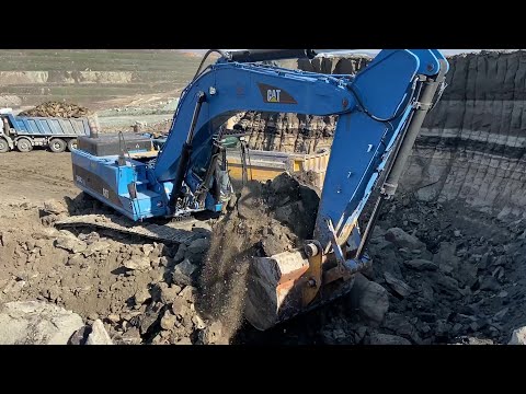 Caterpillar 345C Excavator Loading Mercedes And MAN Trucks