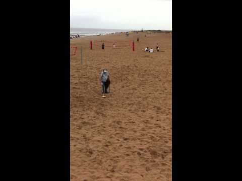 Giving the metal detector man some treasure