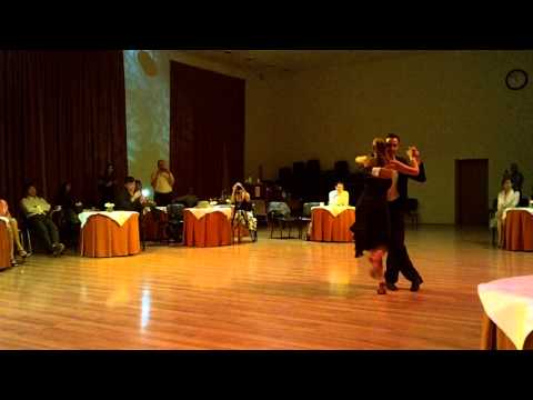  Fausto Carpino  and  Stephanie Fesneau  are  dancing  to  a  vals  at  Kiev International Tango Festival  in  2014