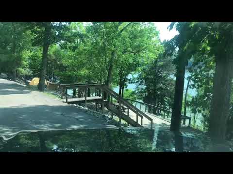 The rear walk in tent sites, parking and showerhouse is at the end of the loop road