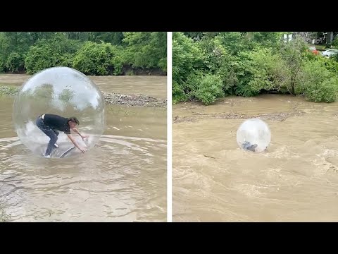 What Was He Thinking? Guy In Hamster Ball Loses Control On River