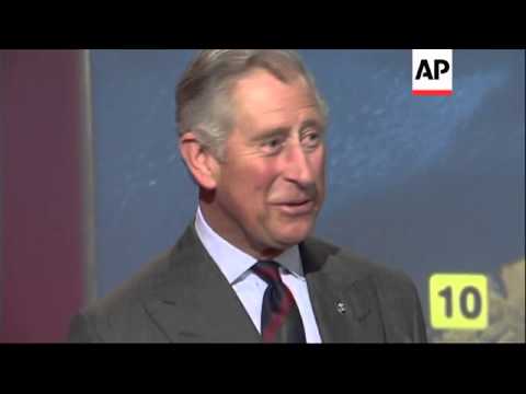 Charles and Camilla try their hand at doing TV weather reports