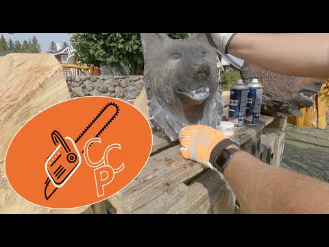 Chainsaw carved wolf face