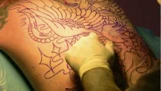 preview picture of video 'Maik´s Back Piece . Tattoo Session 1: Outlining'