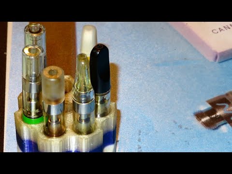 Part of a video titled How to open a 510 cartridge - YouTube