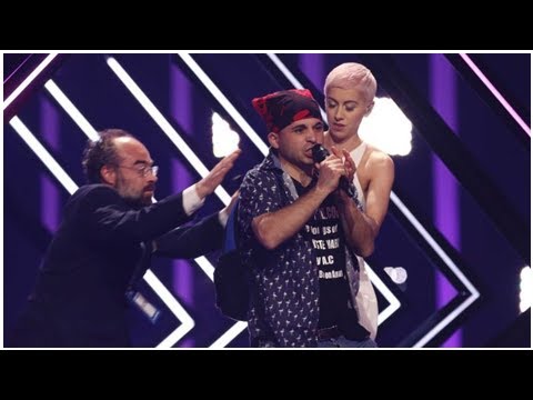 UK's Eurovision number interrupted by mic-grabbing protester