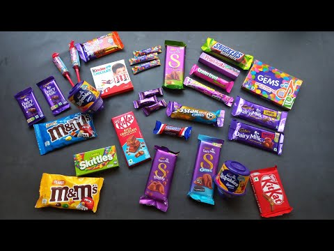 100 candies opening, surprise toys, chocolate a video, lots of chocolates, Cadbury celebration