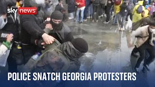 Protesters smash barriers at Georgia