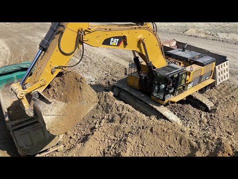 Caterpillar 385C Excavator Loading Overburden At Busy Mining Site - Sotiriadis/Labrianidis