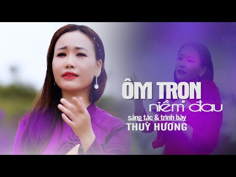 Ôm trọn niềm đau - Thuỳ Hương