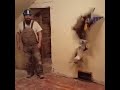 Oh yeah construction guy breaking through wall vine