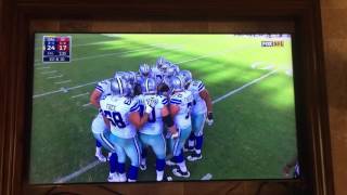 Dallas Cowboys Zack Martin gives a little skeet skeet in the huddle