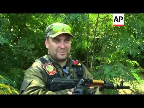 Commander of Vostok battalion near Donetsk says his troops are protecting Ukraine by fighting govern