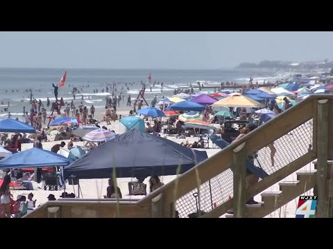 Police out in full force as thousands hit Jacksonville Beach to celebrate Memorial Day