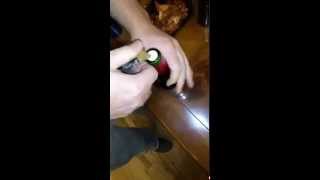 Opening a wine bottle with just a key