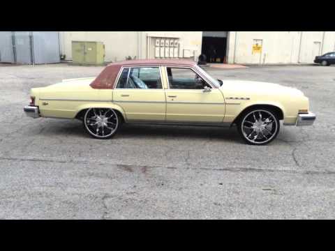 1979 Buick Electra sitting on 24" SIK Chrome Wheels wrapped in Carbon Tires