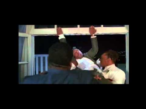 Big Red Davis hangs bird from a balcony