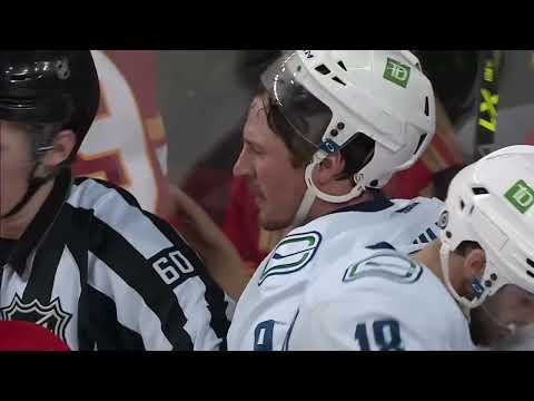 Rough stuff between the Canucks and Flames at the end of the 2nd period