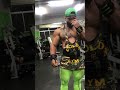 Woship posing flex at gym