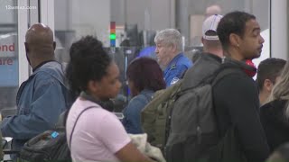 Long lines and crowds at airports across US as TSA workers struggle during government shutdown